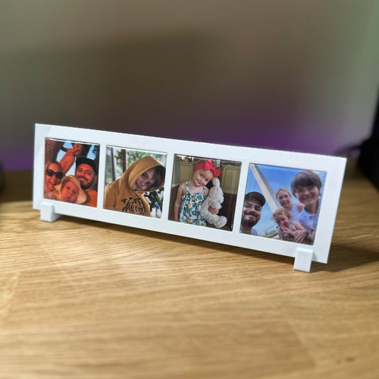 Custom horizontal photo frame with 4 family pictures on a wooden table